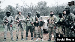 Кадр из пропагандистского видео боевиков-исламистов. 