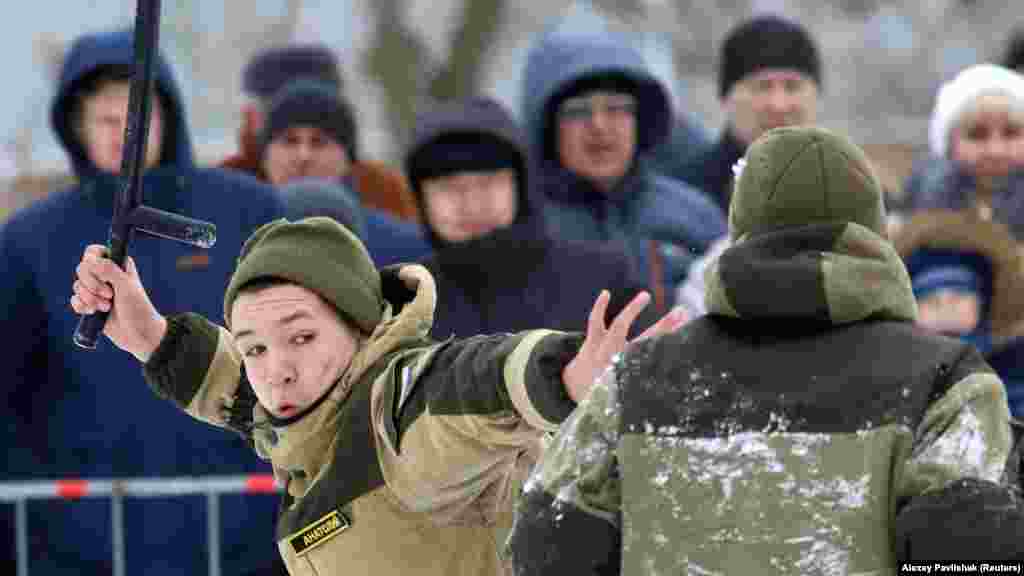 Young members of a military-patriotic club perform during an event in Yevpatoria, western Crimea, marking Defenders of the Fatherland Day on February 23.