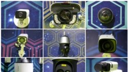 Kombinacija fotografija prikazuje nadzorne kamere Huaveija izložene za vreme Sjetskog obaveštajnog kongresa u Tianjinu u Kini 16. maja 2019.