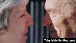 Theresa May i Donald Tusk