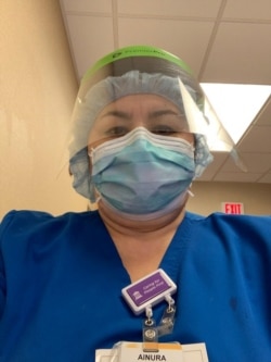 Айнура Айтуварова.