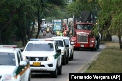 Kamioni sa humanitarnom pomoći USAID-a, Kukuta, 16. februar 2019.