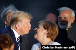 Lecțiile desprinse de Angela Merkel din relația cu Trump în primul lui mandat ar putea fi valoroase pentru liderii de astăzi. Fotografie de la summitul G7 din Biarritz, 2019.