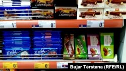 Vendosja e flamujve të origjinës së mallit