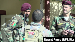 Qureshi and colleagues are being briefed before an operation.