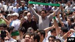 Iranian opposition supporters protest in Tehran after Ahmadinejad's election victory in July 2009.