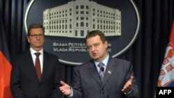 Ivica Dačić i Gido Vestervele na konferenciji za novinare nakon sastanka, 20. maj 2013.