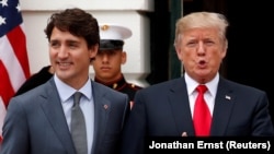 Kanadski premijer Džastin Trudo i američki predsjednik Donald Tramp
