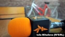 MOLDOVA, BRICENI - RFE/RL symbol on a microphone 