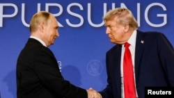 Дональд Трамп и Владимир Путин во время встречи на Аляске, 15 августа 2025 года