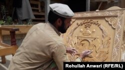 Nuristani woodcarving is now extended to making emblems and other contemporary artifacts for profit.