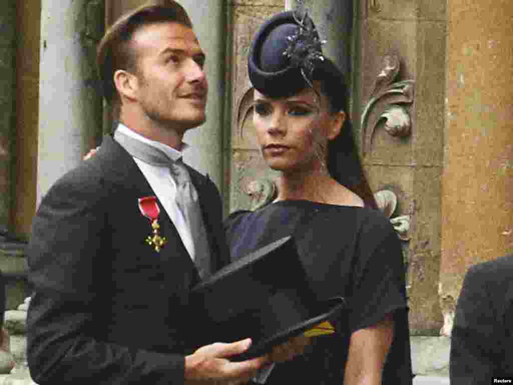 David Beckham sa suprugom Victoriom Foto: Reuters / Kai Pfaffenbach 
