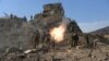 FILE: Afghan National Army soldiers fire a 120mm mortar round during an ongoing anti-Taliban operation in Dangam district near the Pakistan-Afghanistan border in the eastern Kunar Province.