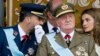 Король Испании Хуан Карлос с сыном - принцем Астурийским Фелипе, и дочерью - принцессой Летицией, Мадрид, 12 октября 2012 года.