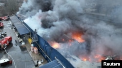 საილუსტრაციო ფოტო არქივიდან. დრონებით შეტევის შედეგად გაჩენილი ხანძარი უკრაინის ქალაქ ნიკოპოლში