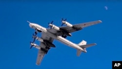 Bombardier strategic Tu-95MS al forțelor aeriene ruse în timpul unei misiuni. 15 februarie 2023. 