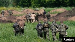 Separatiști pro-ruși, la Donețk, iulie 2014