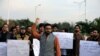PTM supporters chant slogans against the murder of senior police officer Tahir Dawar, whose body was found in Afghanistan after he disappeared from Islamabad in October 2018.