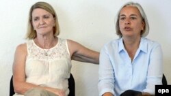 Switzerland -- Associated Press (AP) photographer Anja Niedringhaus (R) and Canadian reporter Kathy Gannon during a visit to the photo agency Keystone, in Zurich, August 27, 2013.