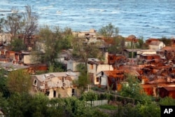 Разрушения в частном секторе Мариуполя. 21 мая 2022 года