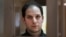 Jurnalistul american Evan Gershkovich, arestat sub acuzația de spionaj, la o audiere la Tribunalul municipal din Moscova, 20 februarie 2024.