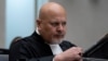 FILE PHOTO: Public Prosecutor Karim Khan prepares for the trial of Mahamat Said Abdel Kani at the International Criminal Court in The Hague