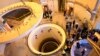 Officials and media tour the heavy water reactor's secondary circuit in Arak, Iran, in 2019. Observers say Iranian officials appear to have concluded that they need a revived nuclear deal to address the country's economic woes.
