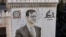 Një portret i Bashar al-Assad i shoshitur nga plumbat në qytetin Hama, Siri.