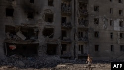 Urmările unui atac aerian la Selidove, din iunie 