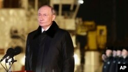 Președintele Rusiei, Vladimir Putin, în timpul unei vizite la Flota Nordului la Murmansk.