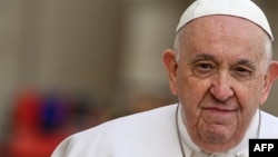 Папа римский Франциск во время еженедельной общей аудиенции 22 марта 2023 года на площади Св.Петра в Ватикане