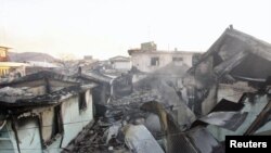 Razrušene kuće na južnokorejskom ostrvu nakon granatiranja od strane Severne Koreje, 24. novembar 2010.
