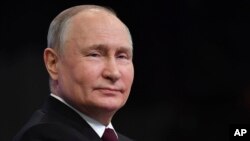 Vlagyimir Putyin orosz elnök éves sajtótájékoztatóján Moszkvában december 14-én