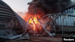 Un depozit de cereale din Odesa, incendiat de un atac cu rachete rusești pe 21 iulie.