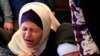 Një grua qan gjatë varrimit të palestinezëve të vrarë nga sulmet izraelite, në Han Junis, 11 maj.