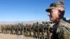 U.S. Army General John Nicholson, the commander of Resolute Support forces and U.S. forces in Afghanistan, speaks with Afghan police special forces in the southeastern Logar province on November 30.