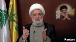 Vođa libanskog Hezbolaha Naim Kasem u obraćanju s nepoznate lokacije, 29. novembar 2024.