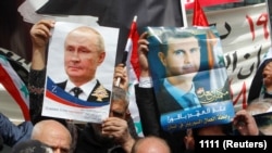 Căderea regimului Assad e considerată o adevărată lovitură pentru Vladimir Putin. Imagine de la o manifestație de sprijin față de invadarea Ucrainei, Liban, 20 martie 2022.
