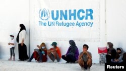 Мигранти на грчкиот остров Лезбос. 