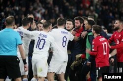 Igrači Gruzije i Grčke, kvalifikacije za Evropsko prvenstvo 2024, Dinamo Arena, Tbilisi, Gruzija, 26. mart 2024.