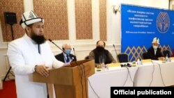 Максатбек Токтомушев.