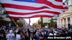 Изборни прослави и протести во САД