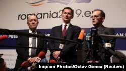 (Left to right:) French Foreign Minister Jean-Yves Le Drian, British Foreign Secretary Jeremy Hunt, and German Foreign Minister Heiko Maas speak to reporters in Bucharest on January 31. 