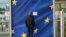 Belgium - A man looks at a sign announcing that a door is closed for security reasons at the European Commission’s Berlaymont building in Brussels, on September 22, 2014. 