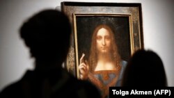 Vânzarea la licitație de către Christie’s, la New York, a tabloului “Salvator Mundi”, atribuit lui Leonardo da Vinci, 22 octombrie, 2017. 