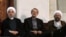 Иран күштік құрлымдарының басшылары: президент Хассан Роухани (сол жақта), парламент спикері Әли Ларижани (ортада) және оның інісі, сот жүйесінің басшысы Садег Ларижани (оң жақта).