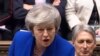  Theresa May vorbind în Parlamentul de la Londra