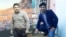 RFE/RL journalists Sabawoon Kakar (left) and Abadullah Hananzai (composite file photo)
