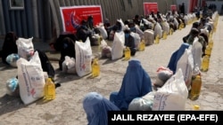 Local Afghan NGOs say that the number of people requiring food assistance is growing as the economy suffers under coronavirus restrictions. 