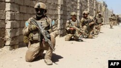 Militari de elită ai Armatei Naționale Afgane în timpul unei operațiuni de luptă în provincia Helmand din Afganistan, 2016